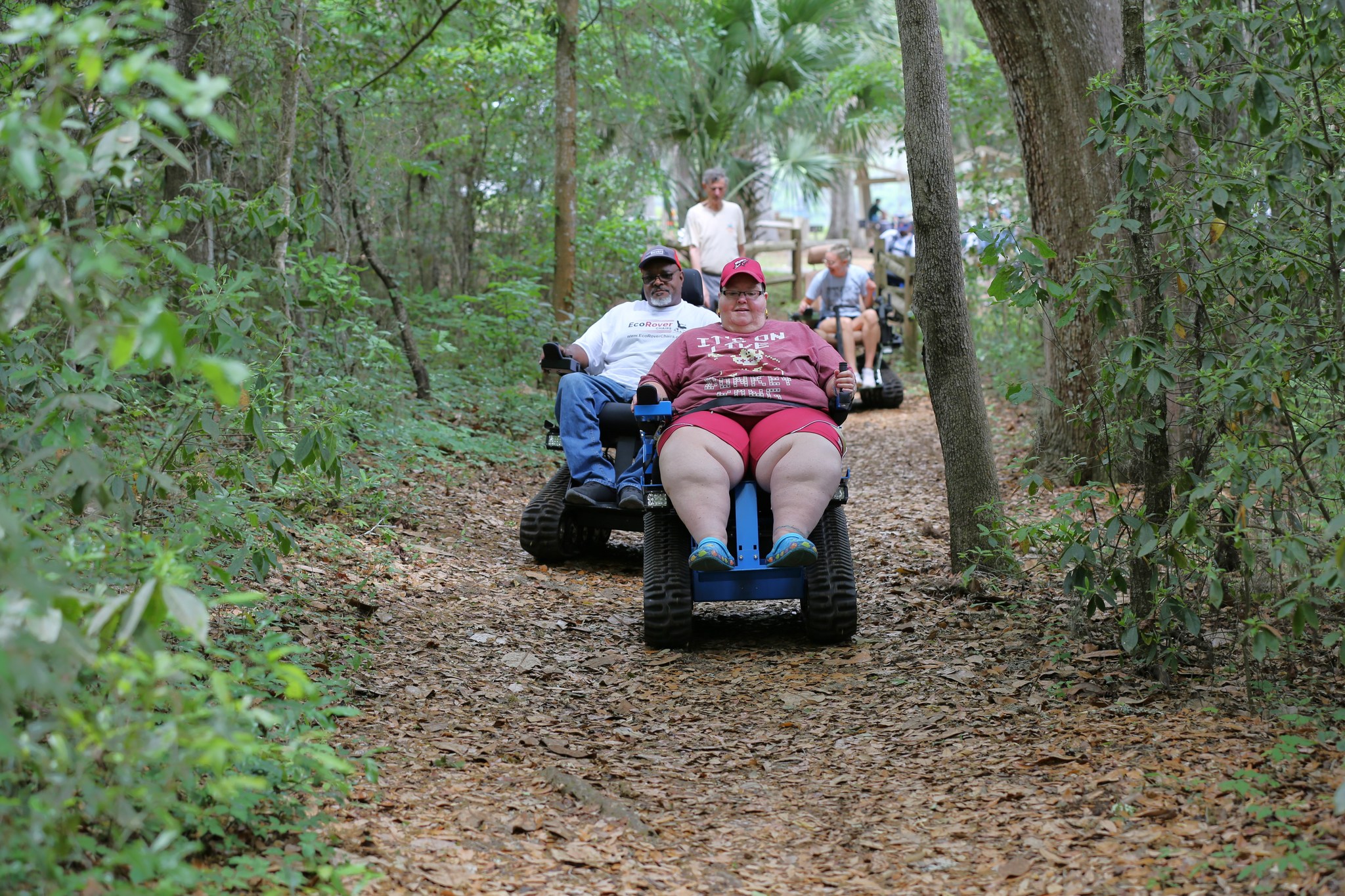 people riding ecorovers on a trail